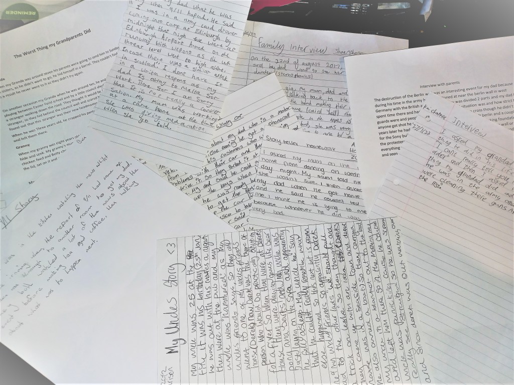 A photo of some of the handwritten stories submitted by S2 pupils at Turriff Academy
