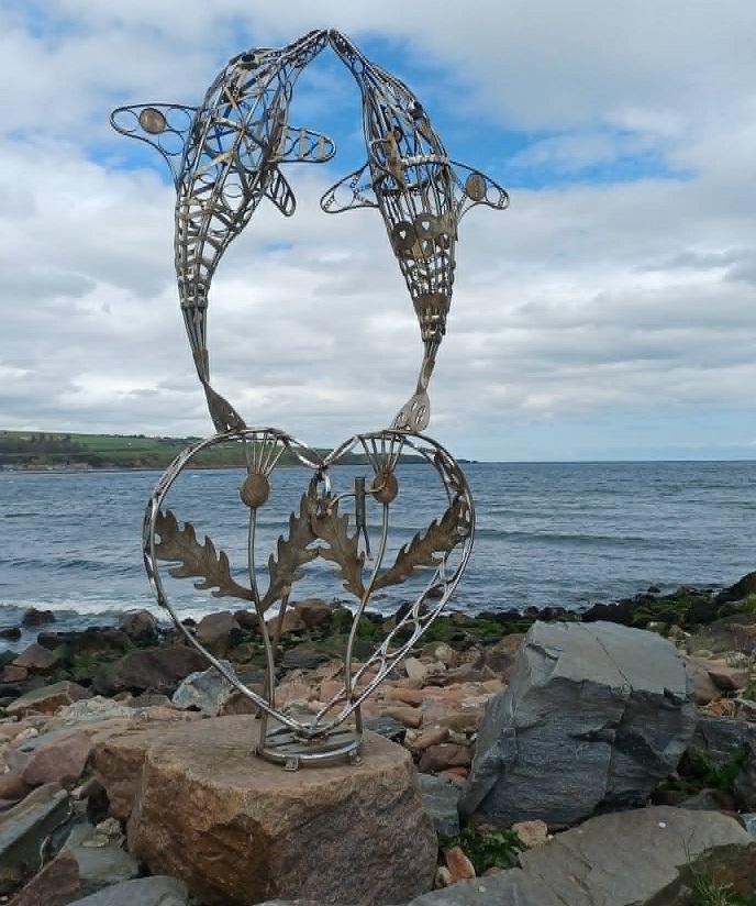 Two dolphins and a heart - see if you can spot Stickman!